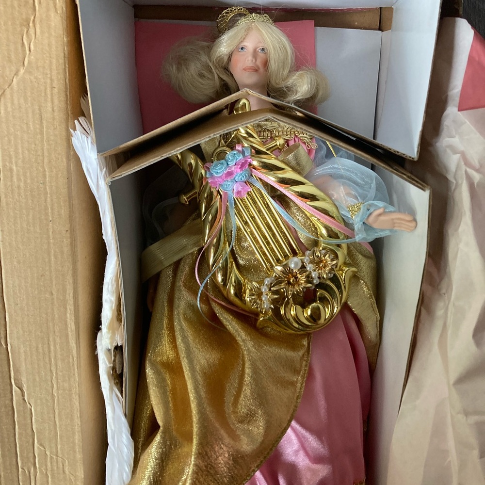 Gold and Pink Collectible Doll
